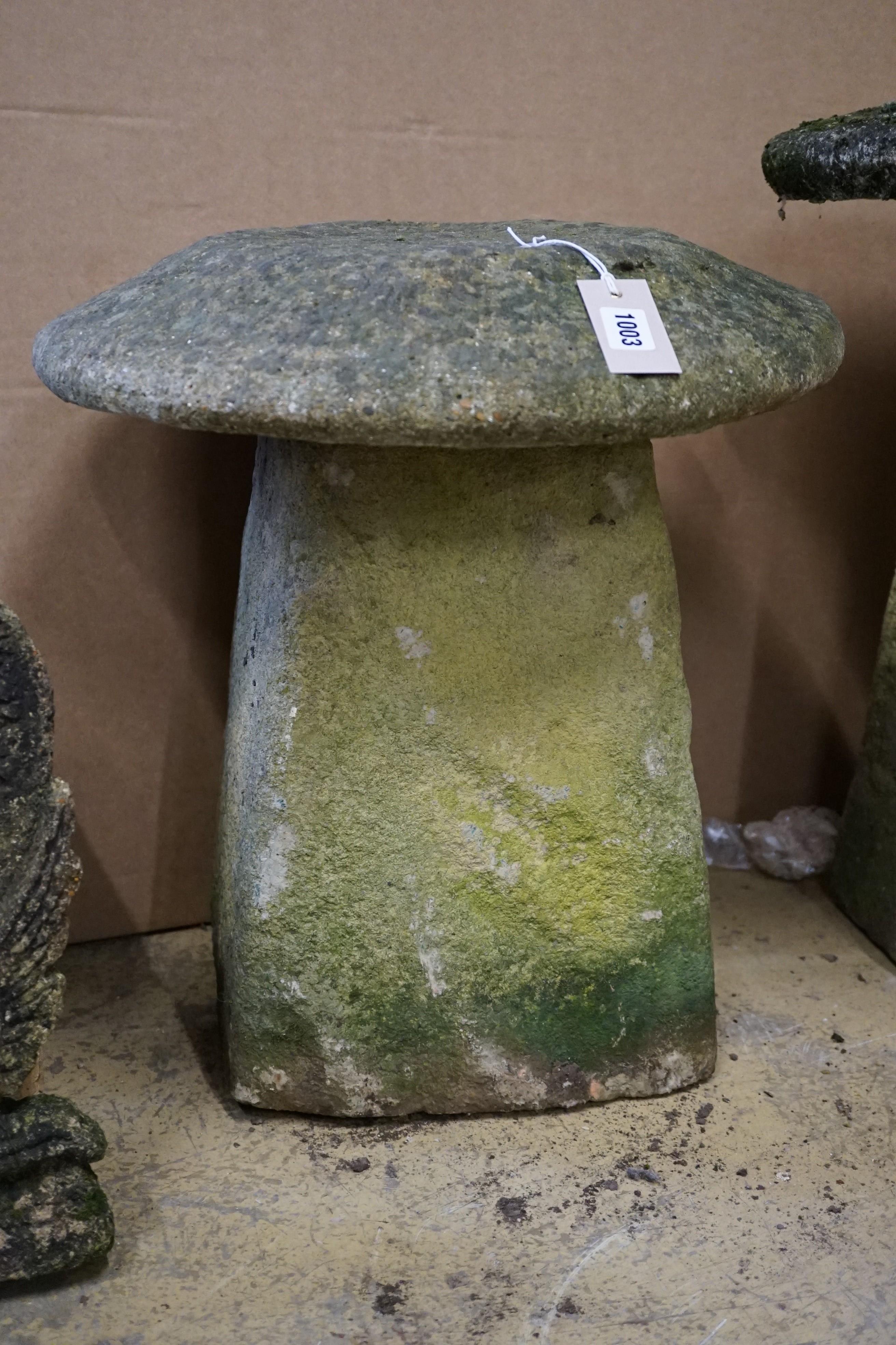 A carved stone staddle stone, height 64cm, diameter 54cm